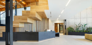 The large main lobby of ABIC Head Office is illuminated by a line of recessed Rail 2 luminaires